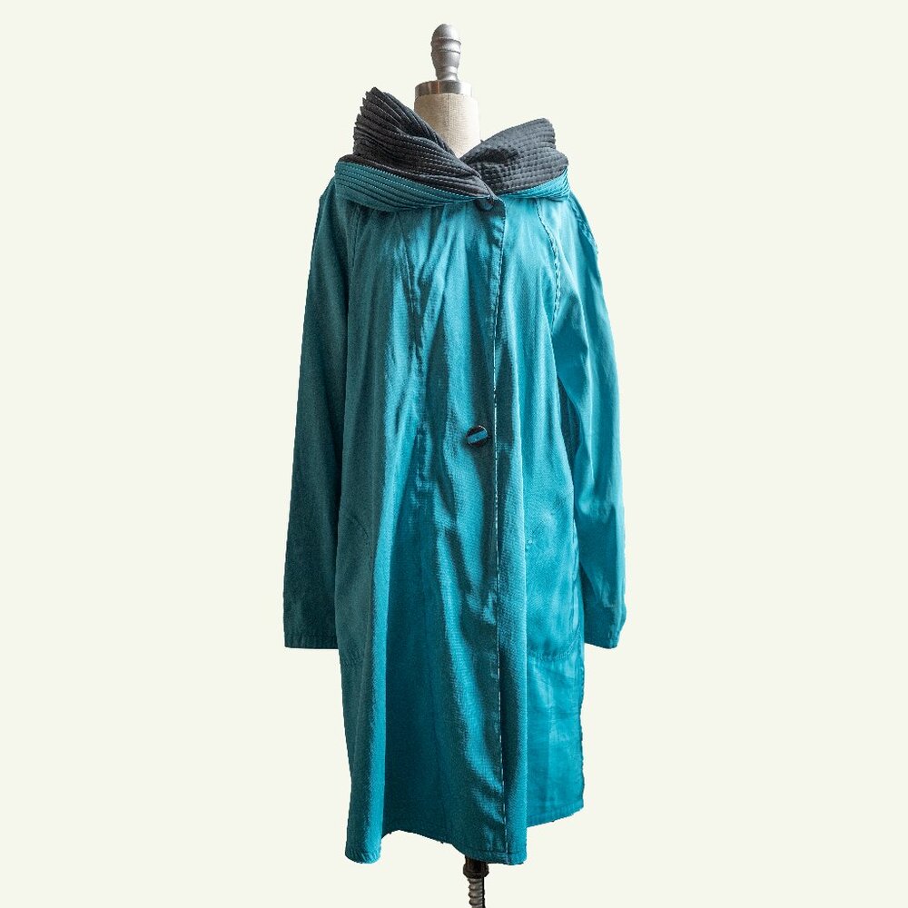 Mycra Pac Now Teal Black Donatella Pleated Hood Jacket